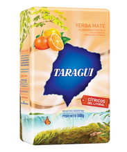Load image into Gallery viewer, Taragüi Yerba Mate Citrus Flavor 1.1lb  Taragüi Yerba Mate Citricos Del Litoral 500g   Transport yourself to the Littoral, the ideal region to grow citrus fruits and enjoy the flavor of the best yerba mate and a touch of the tastiest oranges, mandarins and grapefruits.   Product of Argentina Ships from the USA
